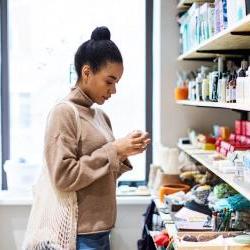 Young African woman shopping