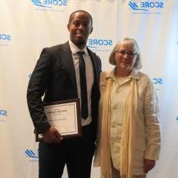 SCORE Mentor Donna LeBreux and Manasse Shingiro