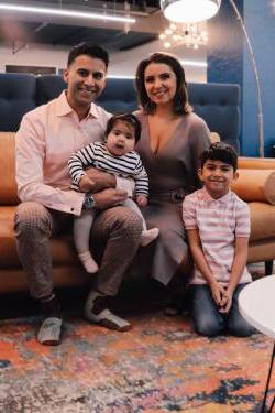 Picture of Gabriela and family sitting in living room